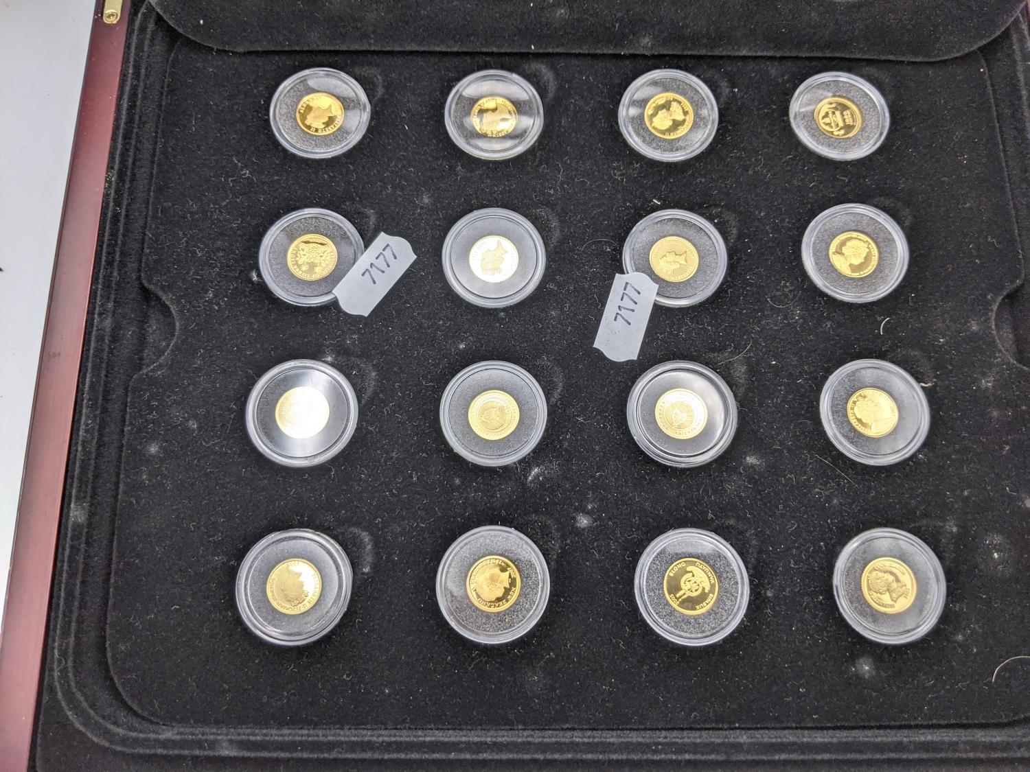 The Worlds Finest Gold Miniatures - A cased set of 32 24ct Gold miniature coins to include, 2009 - Image 5 of 6