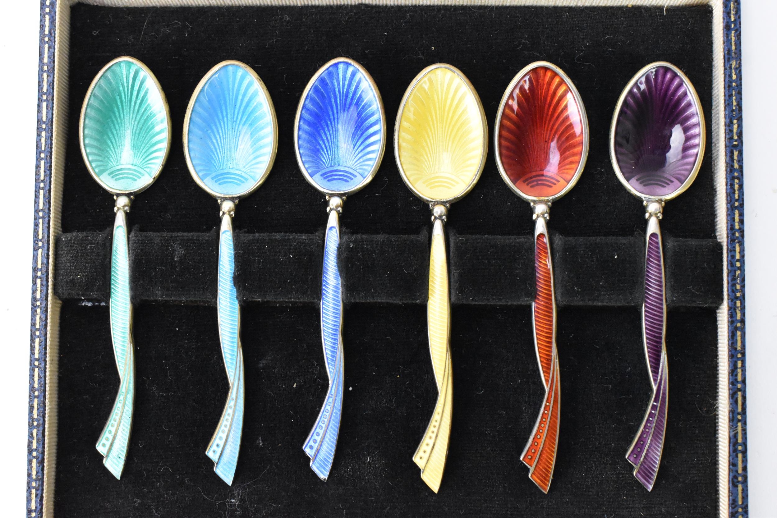 A cased set of six mid 20th century coffee bean spoons, retailed by Harrods, all having guilloche - Image 3 of 6