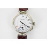 An unusual early 20th century trench style wristwatch to time a game of rugby, the white enamel dial