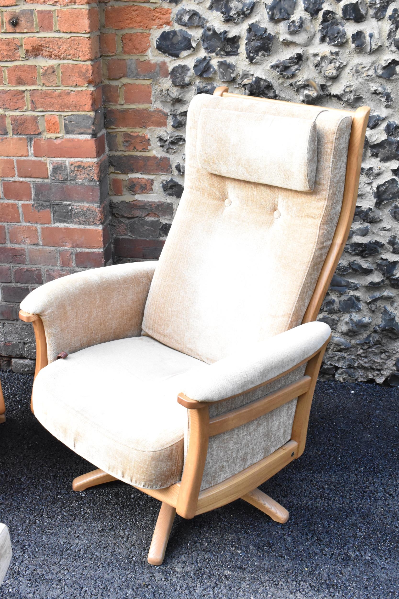 A pair of vintage Ercol Gina light elm manual reclining armchairs upholstered in beige fabric with - Image 3 of 6