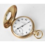 An early 20th century Record Dreadnought, 9ct gold, open faced pocket watch, the white enamel dial