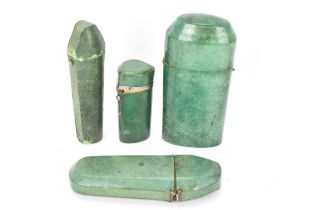 Four late 19th century shagreen items with hinged lids to include a pin cushion, two scent bottle