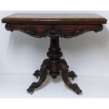***THIS LOT HAS BEEN WITHDRAWN***A Victorian rosewood fold over card table having a green baize