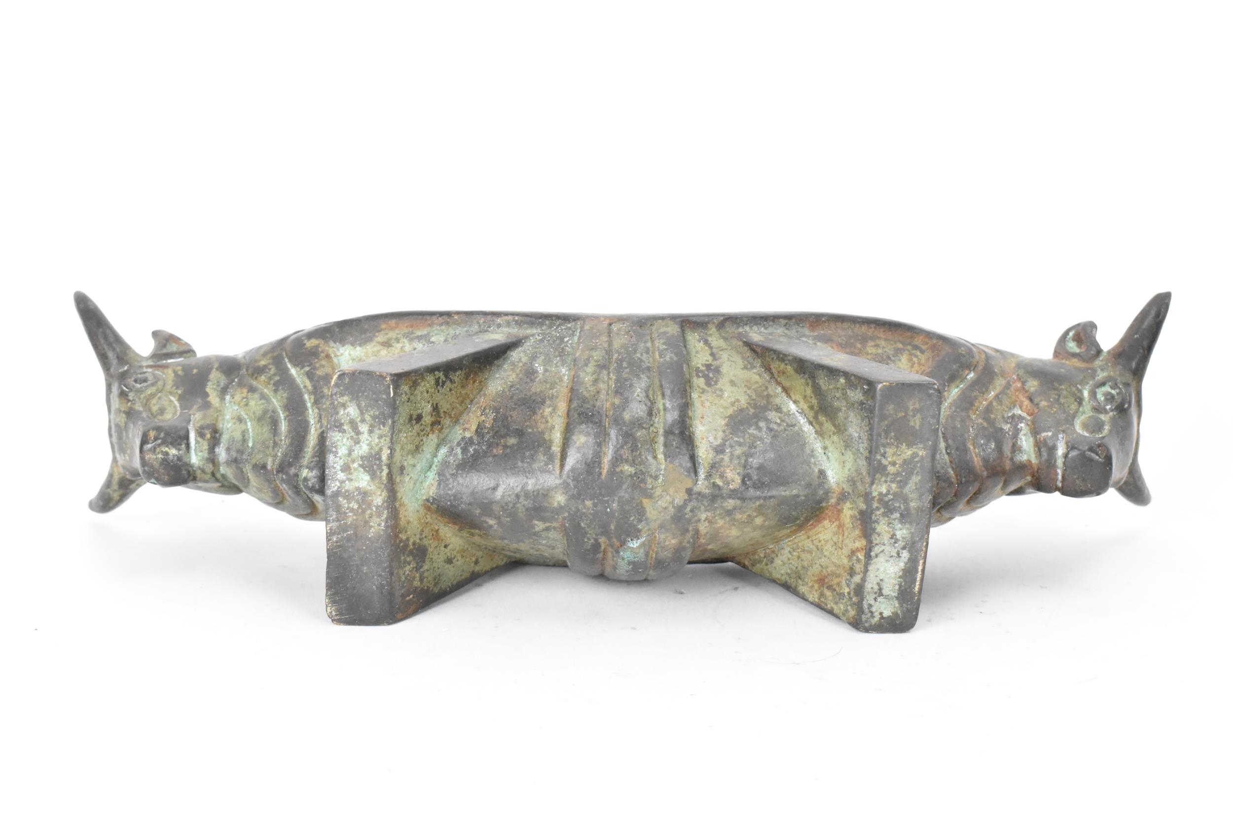 A 20th century Chinese patinated bronzed oblong shaped bowl, the sides fashioned as two bulls - Image 4 of 4