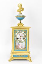 A late 19th century French mantle clock, the gilt metal case cast with floral scoll decoration,