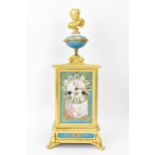 A late 19th century French mantle clock, the gilt metal case cast with floral scoll decoration,
