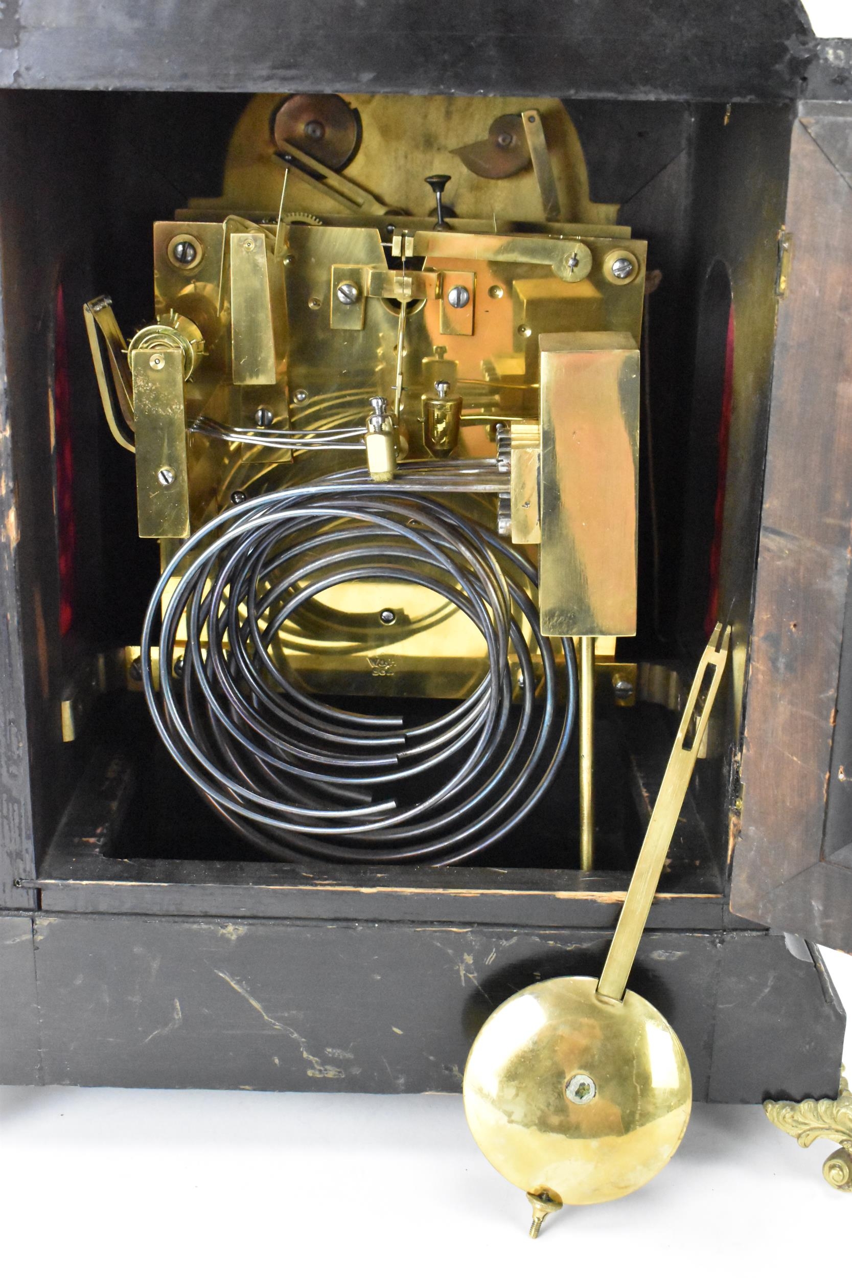 A late 19th century Winterhalder & Hofmeier ebonised mantle clock, the arched top case having cast - Image 6 of 7