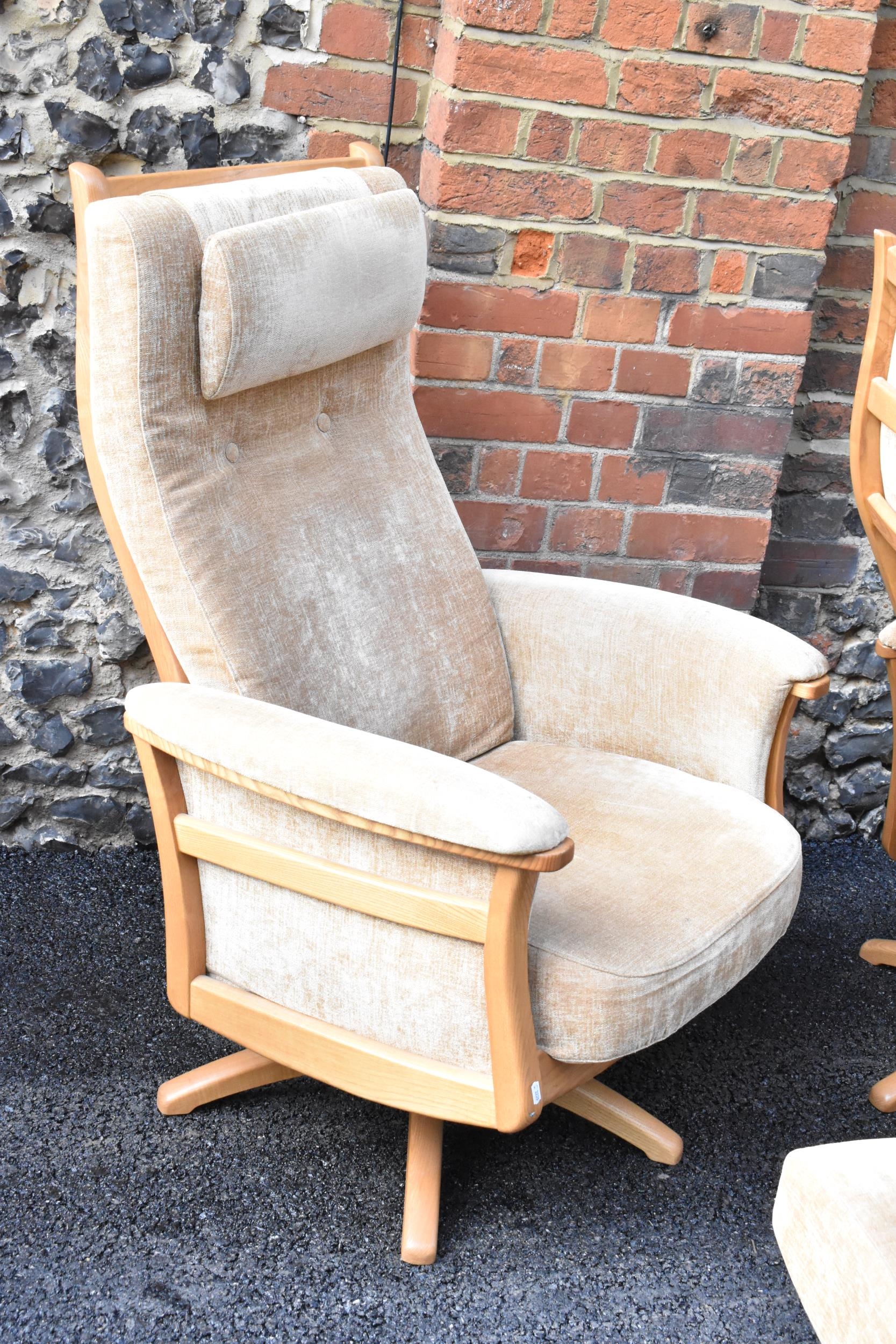 A pair of vintage Ercol Gina light elm manual reclining armchairs upholstered in beige fabric with - Image 5 of 6