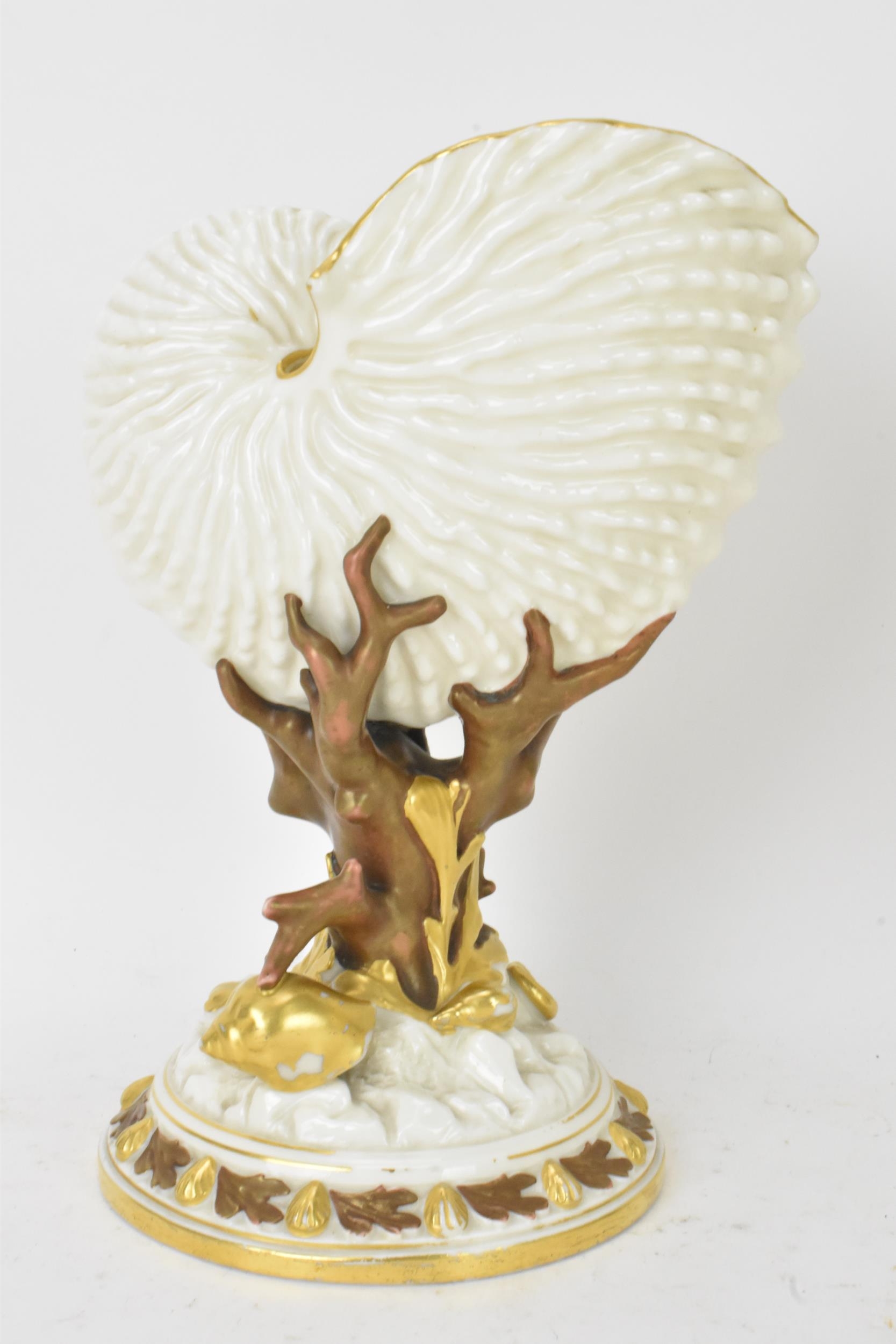 A late 19th century Royal Worcester porcelain spoon warmer, date mark for 1884, modeled in the