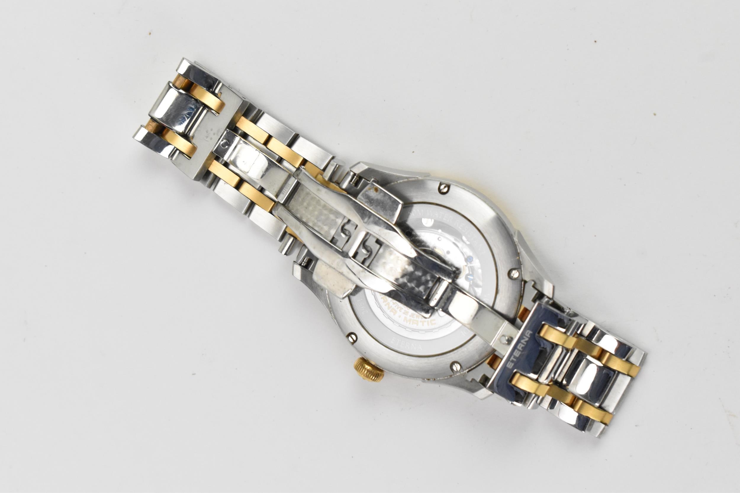 An Eterna, automatic, gents, stainless steel, bi-coloured wristwatch, having a silvered dial, centre - Image 4 of 6