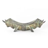 A 20th century Chinese patinated bronzed oblong shaped bowl, the sides fashioned as two bulls