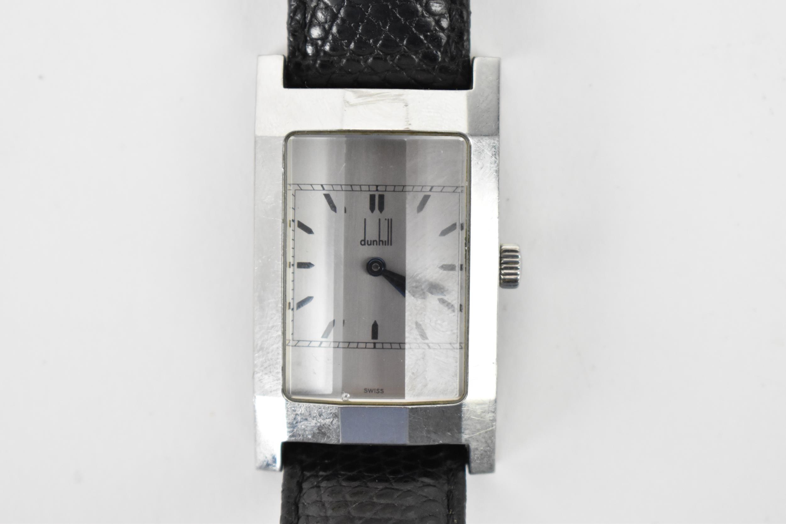 A Dunhill, manual wind, gents, stainless steel wristwatch, circa 1996, having a silvered dial, baton