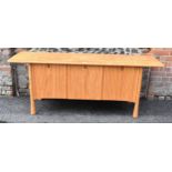 A rare 20th century Ercol Saville elm sideboard The oversized plank top raised over a ridged base