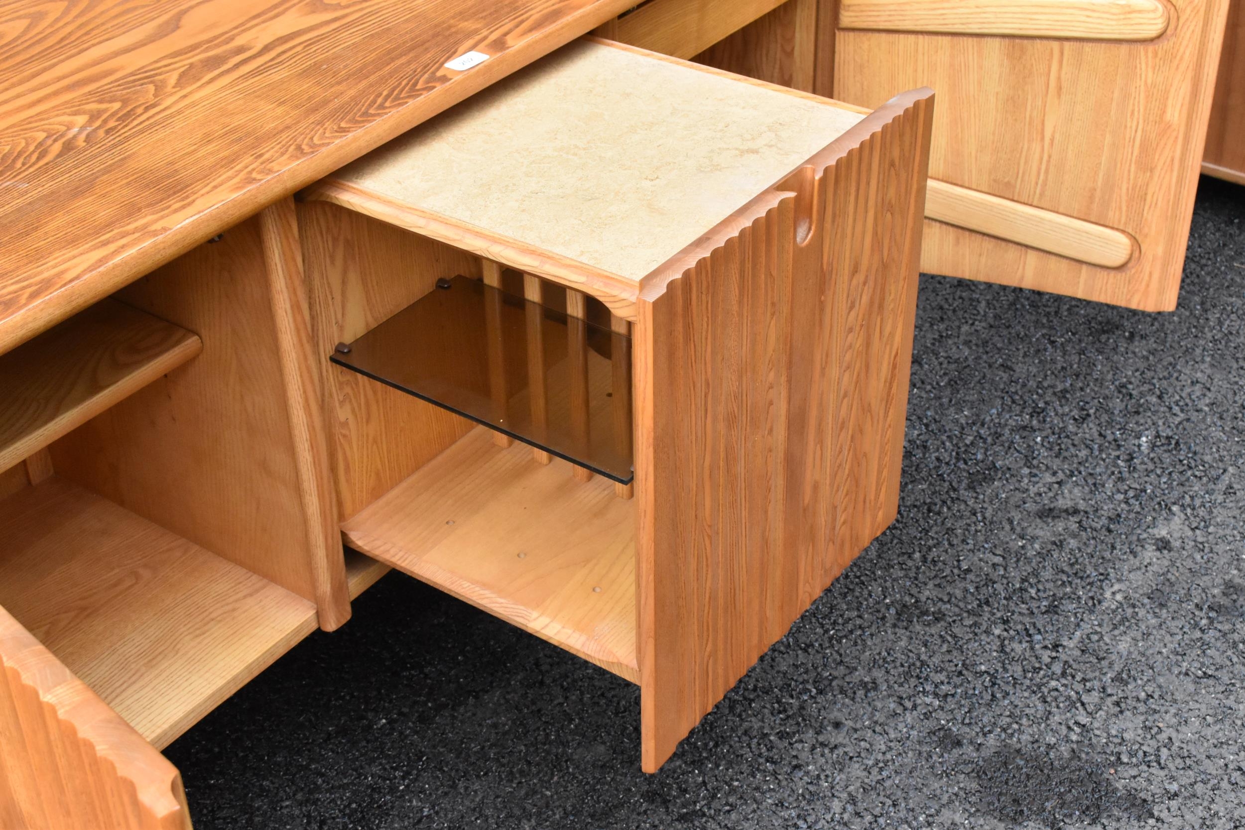 A rare 20th century Ercol Saville elm sideboard The oversized plank top raised over a ridged base - Image 6 of 6