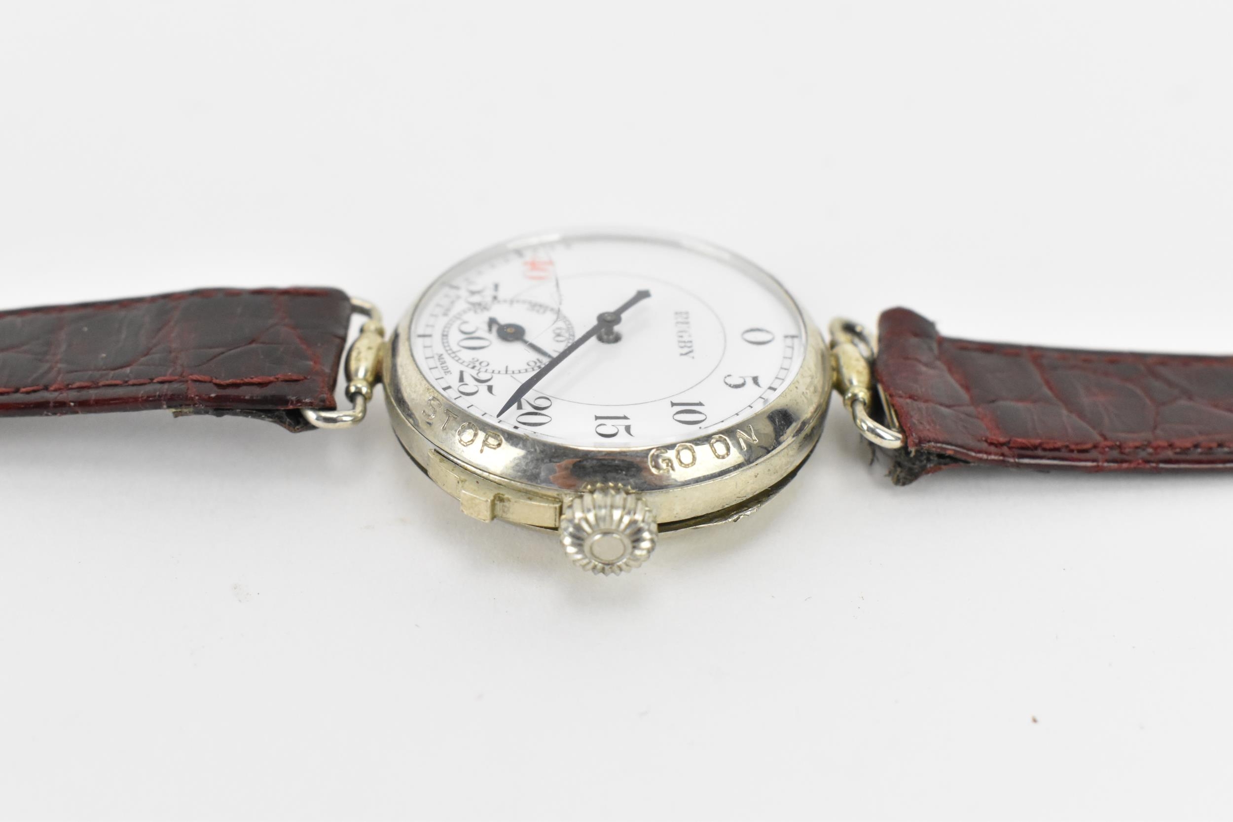 An unusual early 20th century trench style wristwatch to time a game of rugby, the white enamel dial - Image 3 of 5