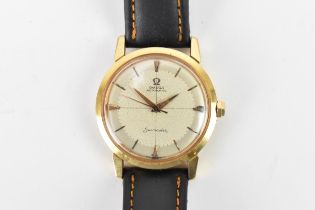 An Omega Seamaster, automatic, gents, 18ct gold wristwatch, having a silvered pie pan dial, centre