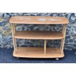 A mid 20th century Ercol elm and beech Baby Giraffe three tier trolley, model 361, Windsor range,