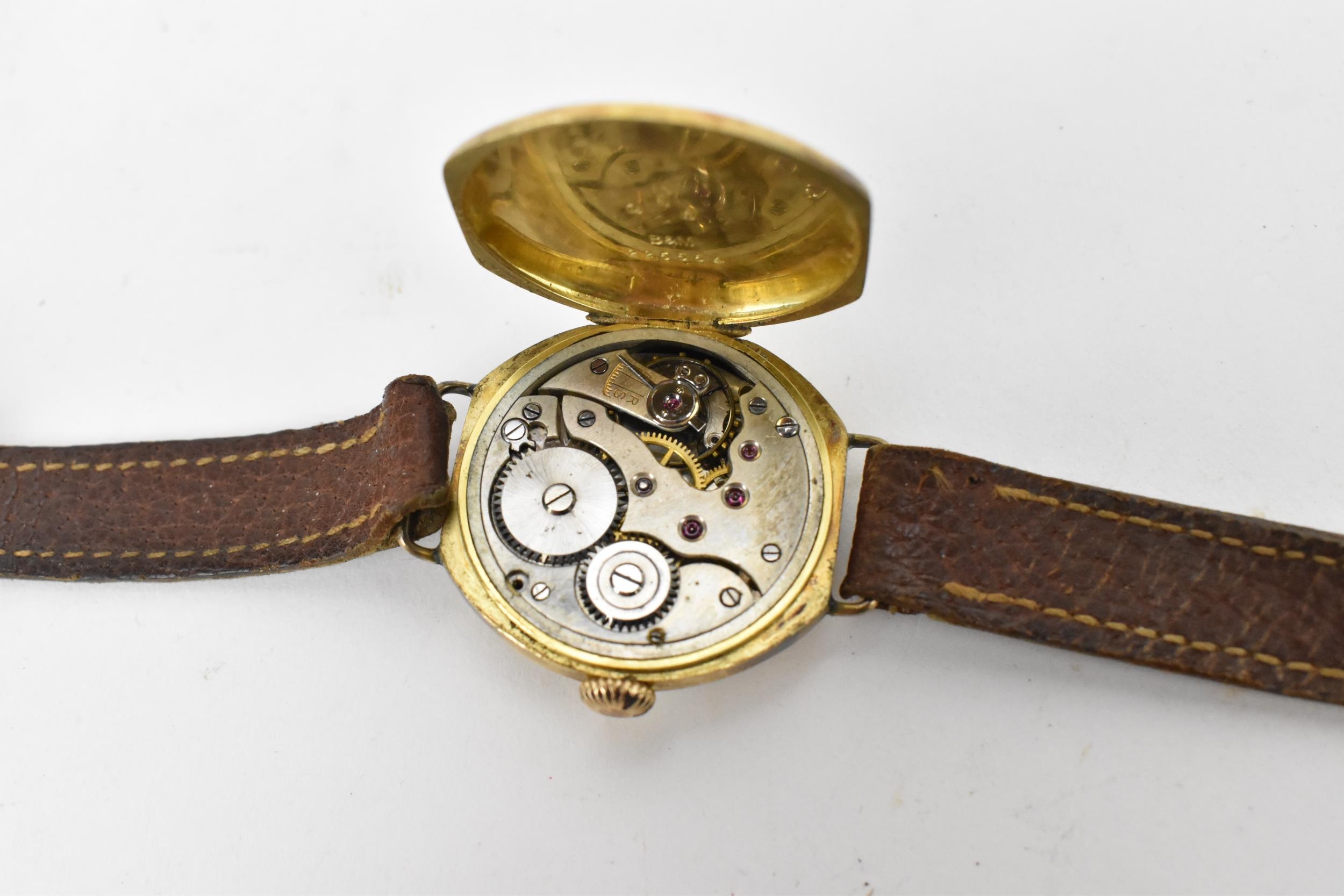 A 1920s, manual wind, gents, 18ct gold wristwatch, having a white enamel dial, subsidiary seconds - Image 7 of 7