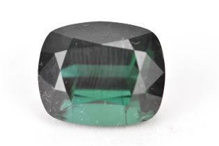 A faceted cut loose green tourmaline gemstone, 16.7mm x 13.7mm x 10.6mm