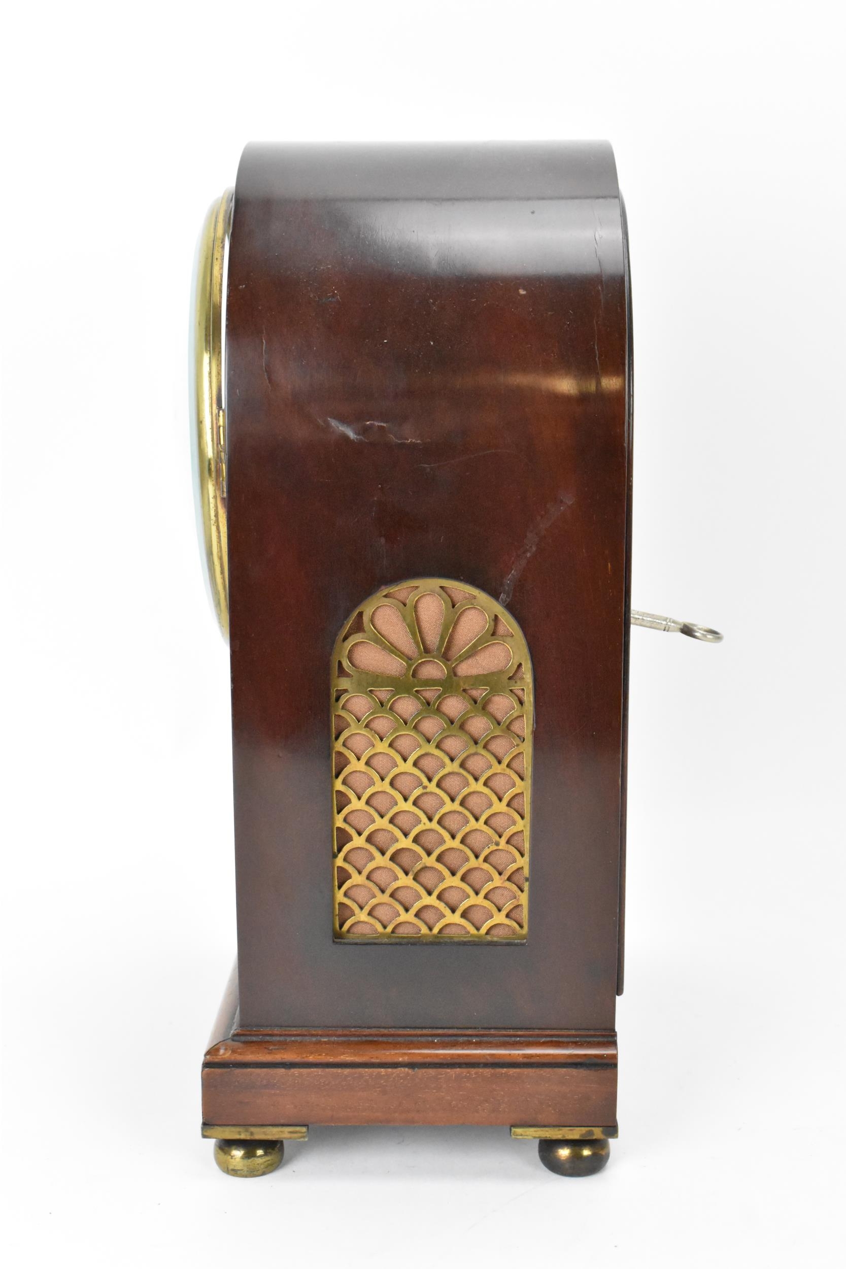 A 19th century mahogany bracket clock, the case having an arched top with gilt pierced side - Image 5 of 8