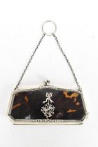 A George V tortoiseshell and silver purse, with suspension chain, Adams style silver inlaid