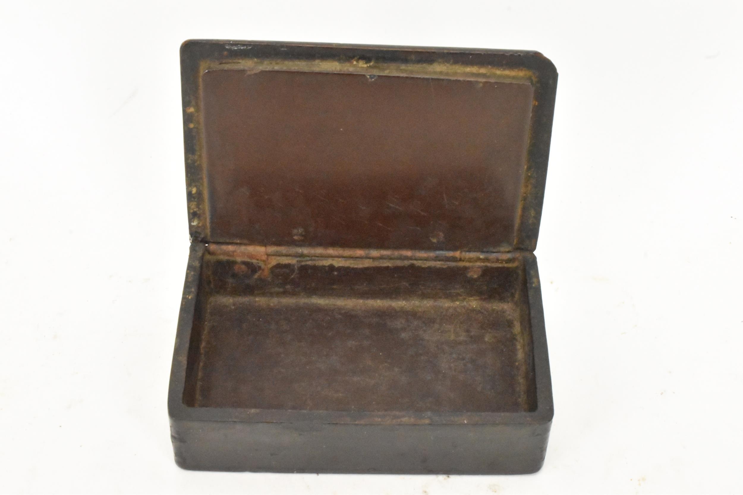 A 19th century black papier mache snuff box, the the hinged cover painted with a three quarter - Image 7 of 7