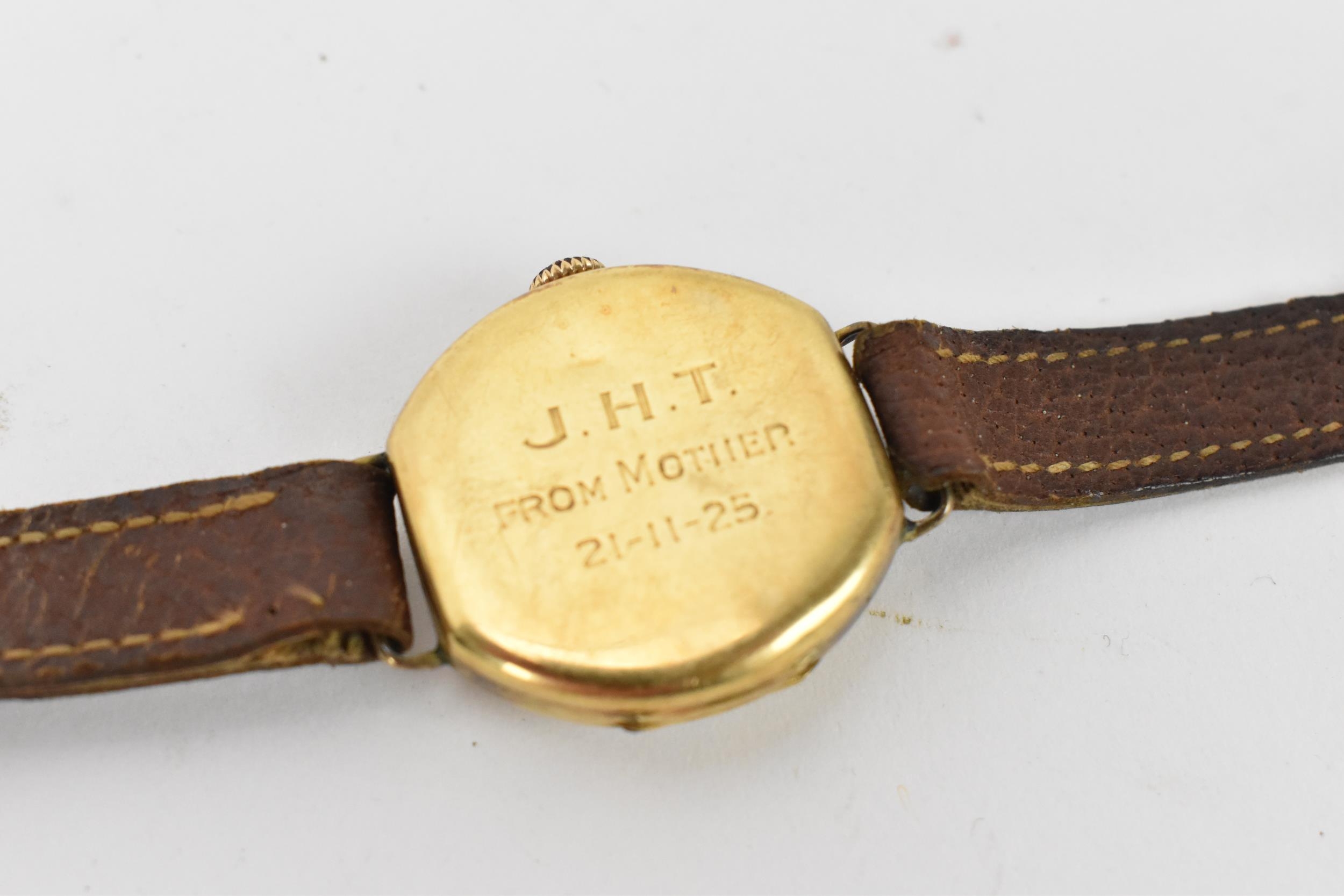 A 1920s, manual wind, gents, 18ct gold wristwatch, having a white enamel dial, subsidiary seconds - Image 5 of 7