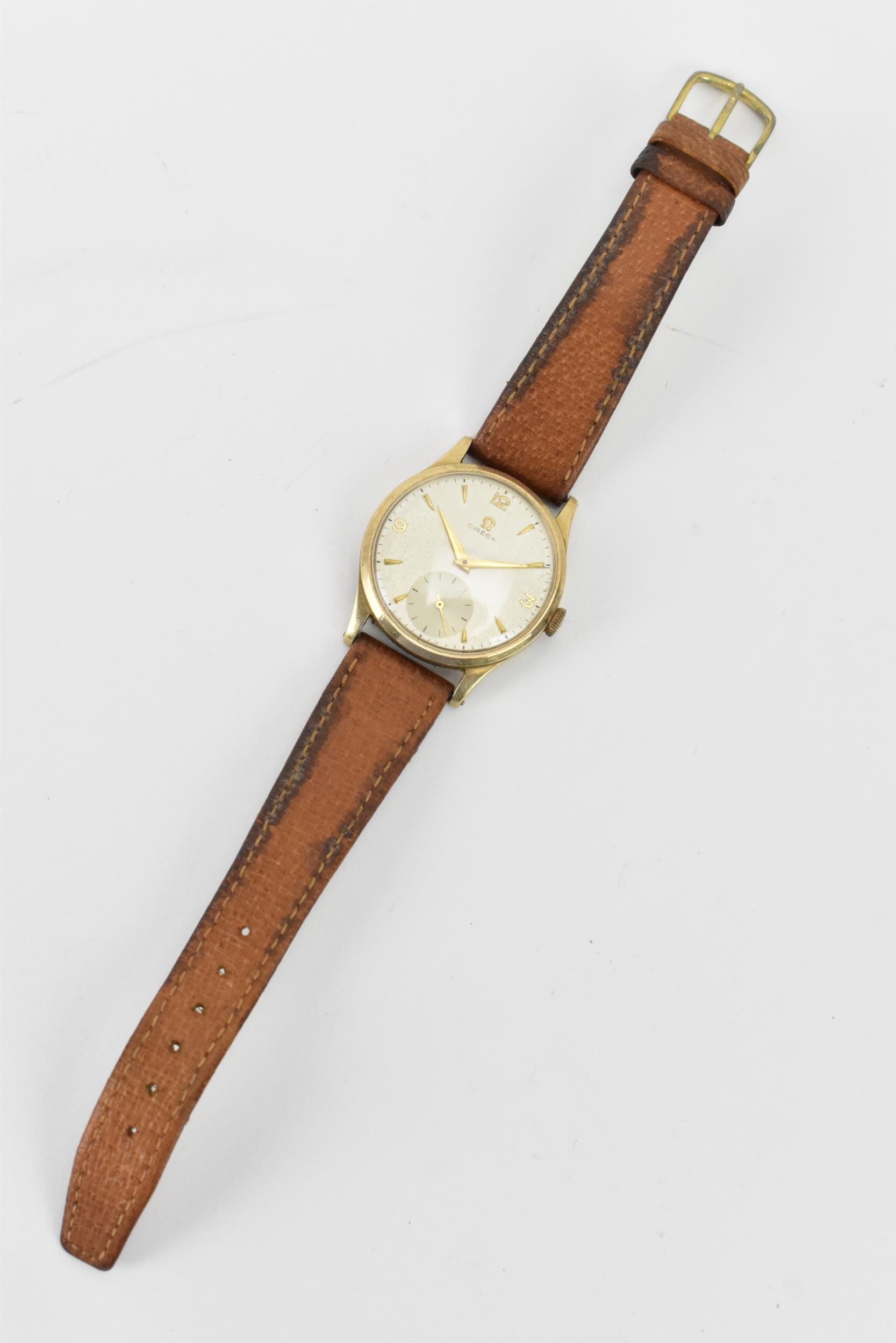 An Omega, manual wind, gents, 9ct gold wristwatch, circa 1950s, having a silvered dial, subsidiary - Image 2 of 6