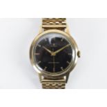 A Rolex, manual wind, gents, 9ct gold wristwatch, circa 1937, having a black dial, centre seconds,