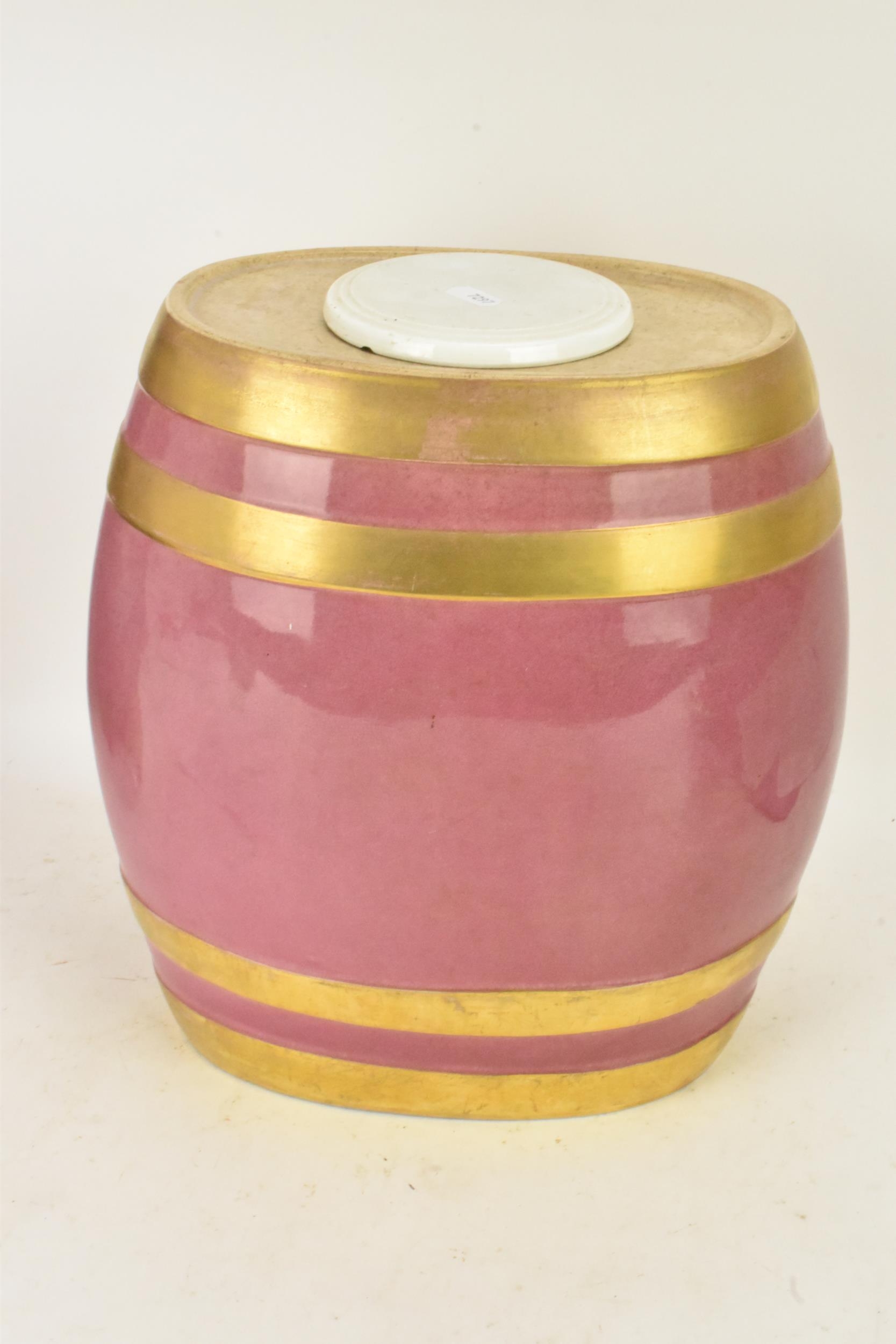 A Victorian ceramic cloves barrel, of oval shape and decorated with a pink ground with gilt bands - Image 3 of 6