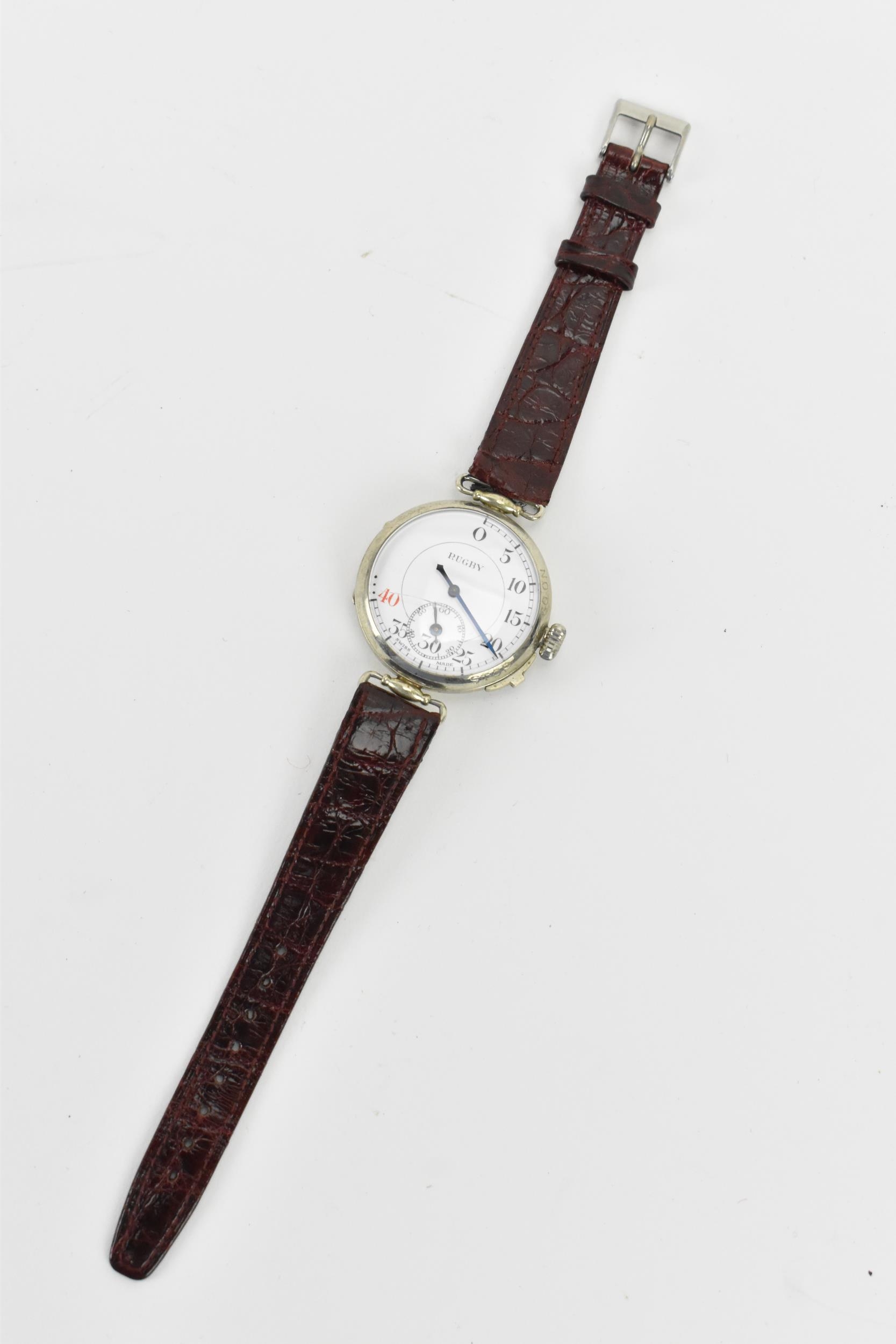 An unusual early 20th century trench style wristwatch to time a game of rugby, the white enamel dial - Image 2 of 5