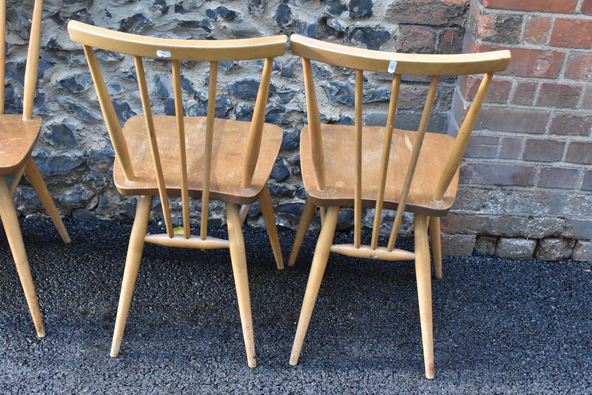 A set of four Ercol blonde elm and beech kitchen dining chairs, model 391, having spindle stick back - Image 4 of 9