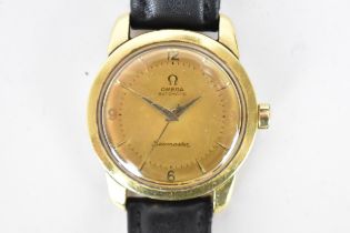An Omega Seamaster, automatic, gents, 18ct gold wristwatch, having a gilt pie pan dial, centre