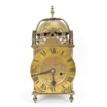 A circa 1900 Mappin & Webb lantern clock, in the 17th century style, the brass case having a