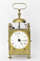 An early 19th century French capucine travel alarm clock, having a 3.5 inch white enamel dial with