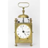 An early 19th century French capucine travel alarm clock, having a 3.5 inch white enamel dial with