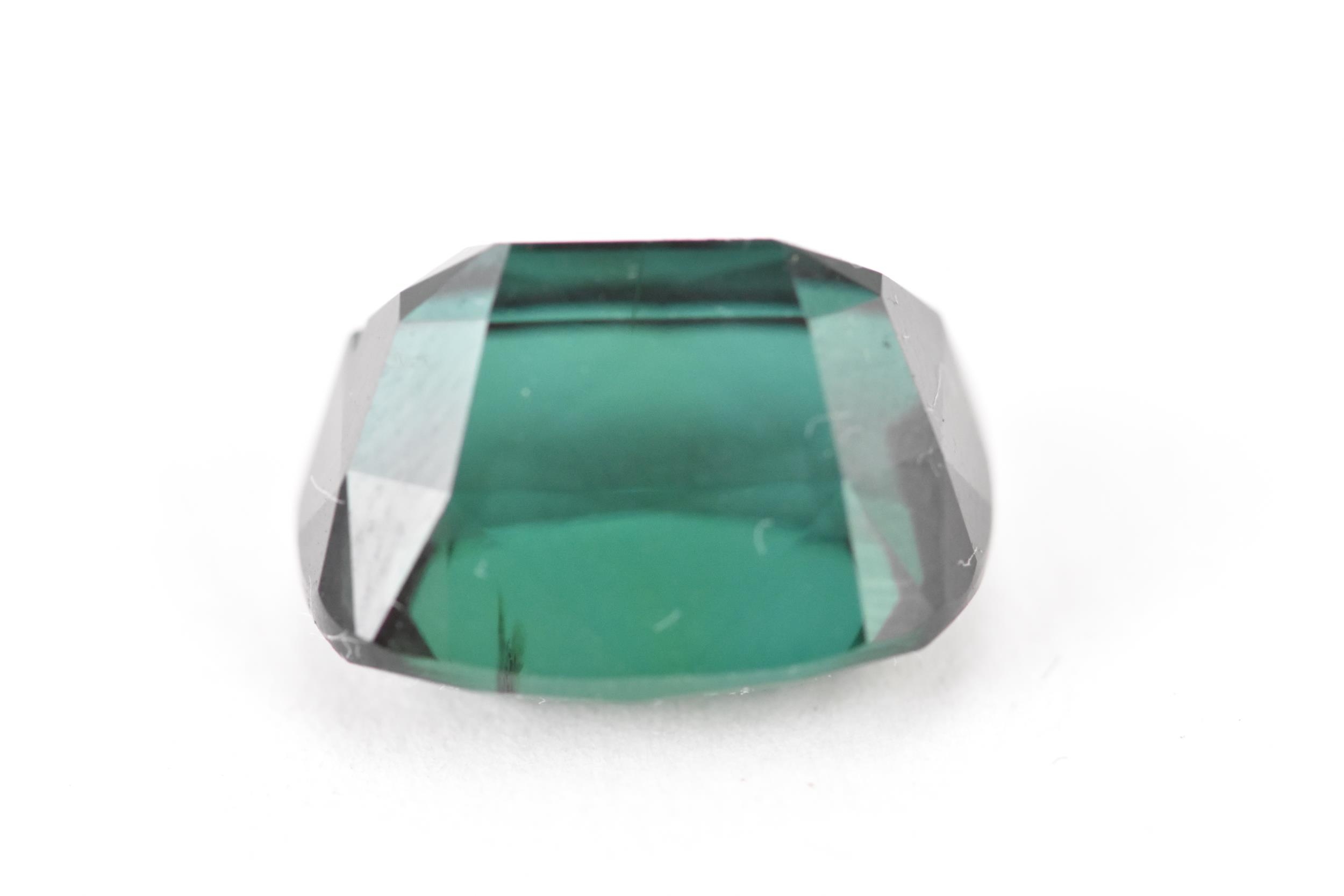 A faceted cut loose green tourmaline gemstone, 16.7mm x 13.7mm x 10.6mm - Image 2 of 2