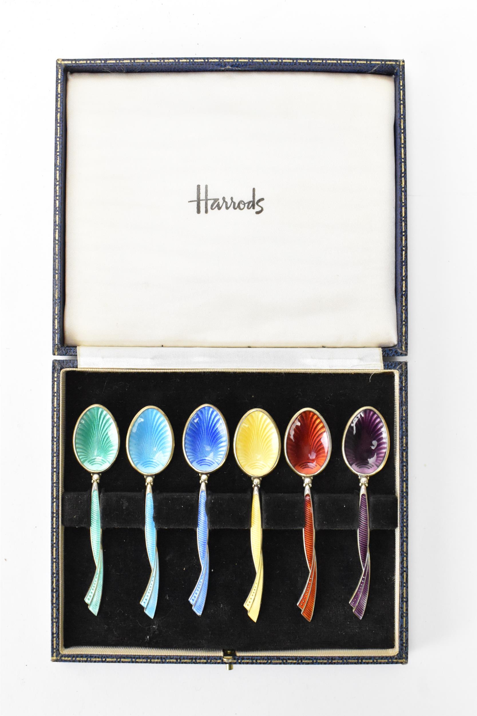 A cased set of six mid 20th century coffee bean spoons, retailed by Harrods, all having guilloche - Image 2 of 6