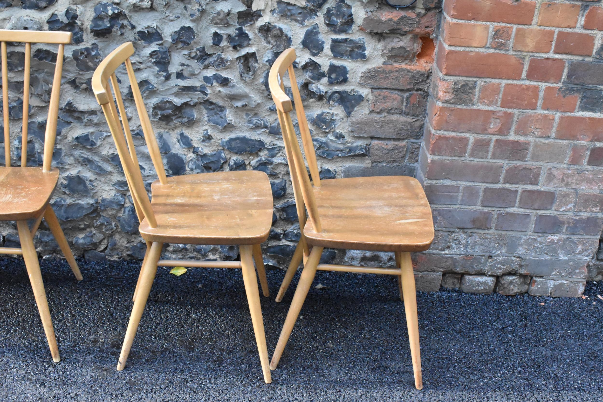 A set of four Ercol blonde elm and beech kitchen dining chairs, model 391, having spindle stick back - Image 3 of 9