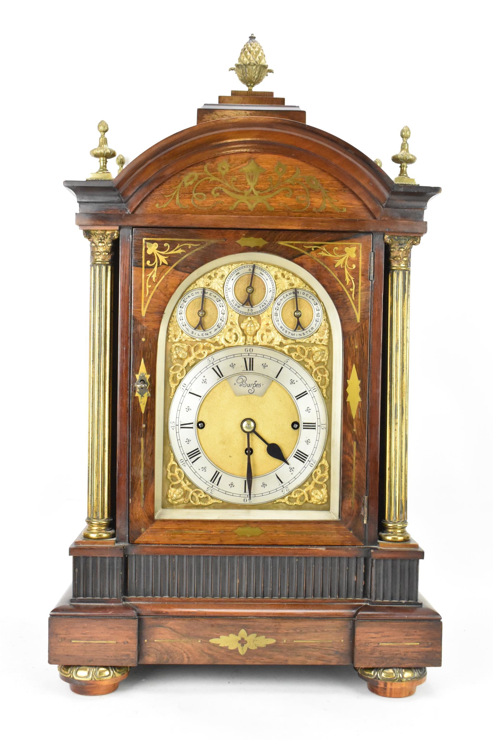 An early 20th century large boardroom triple fusee clock, the rosewood case having three gilt