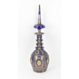 A large 19th century bohemian flash overlay and jewelled cut glass decanter, in cobalt blue