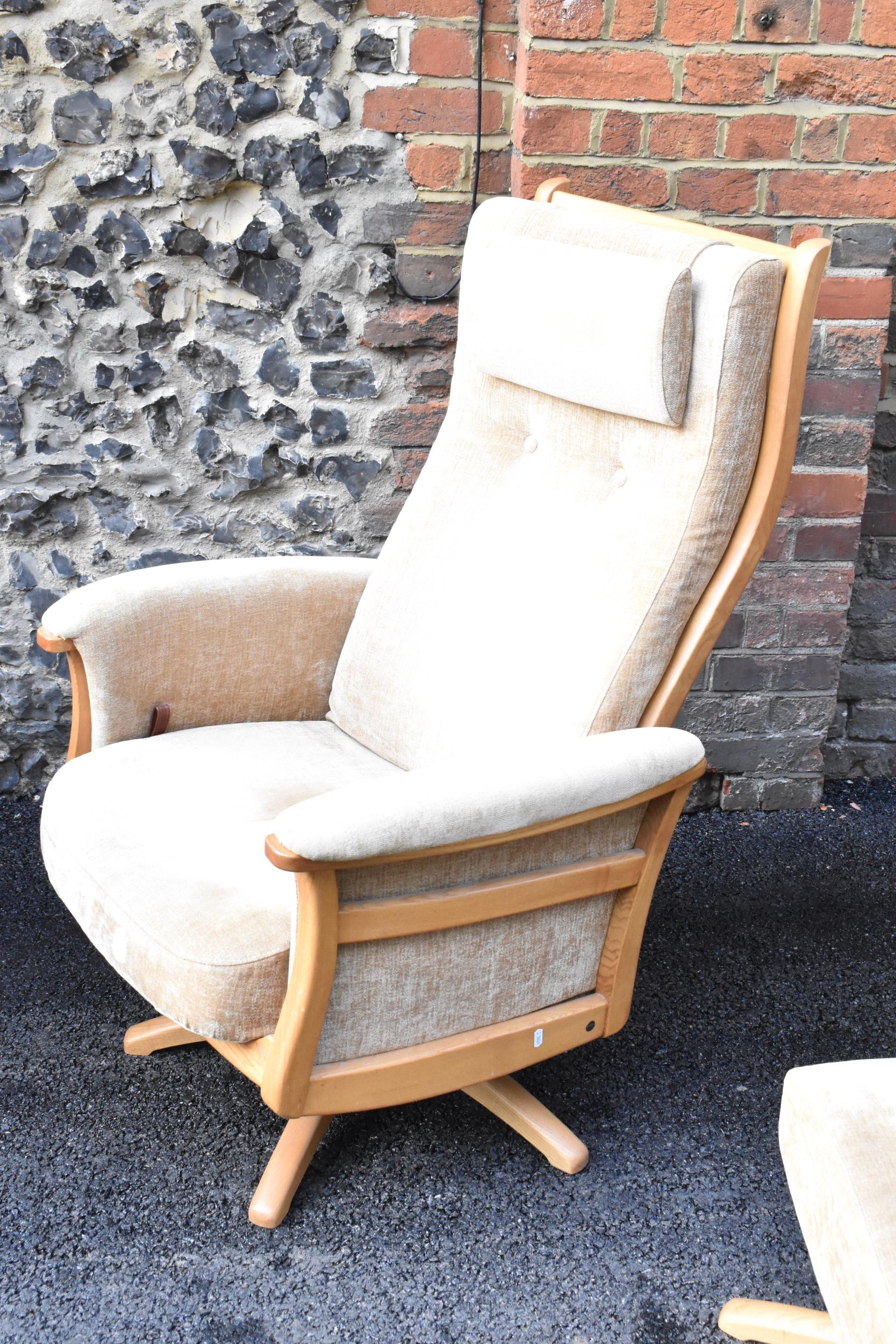 A pair of vintage Ercol Gina light elm manual reclining armchairs upholstered in beige fabric with - Image 6 of 6