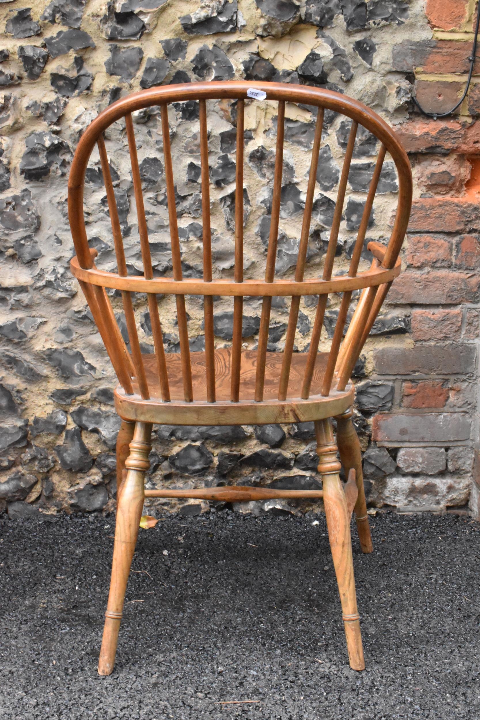 A pair of 19th century elm and ash Windsor carver dining chairs, having spindle hoop shaped backs, - Image 4 of 11