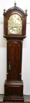 A George III mahogany longcase clock, the case having an arched top with three ball and spike