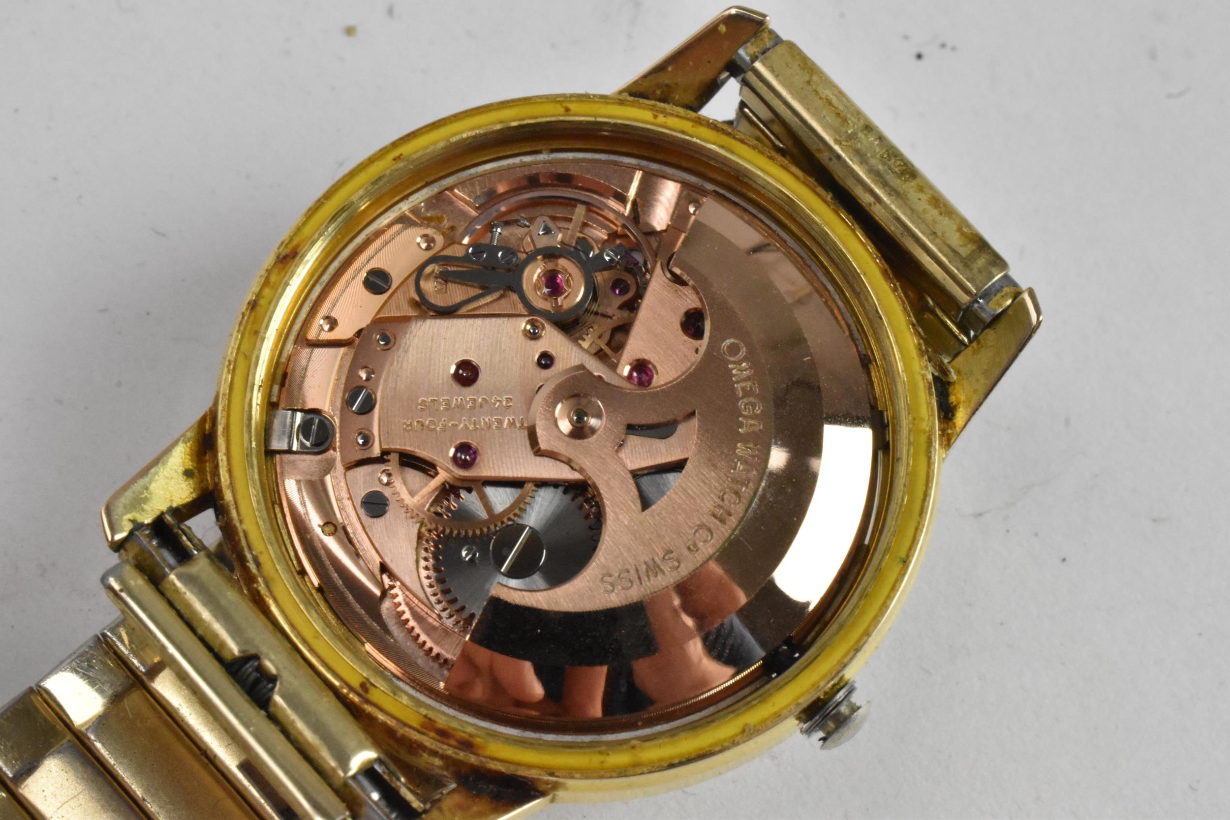 An Omega Seamaster, automatic, gents, gold plated wristwatch, having a silvered dial, centre - Image 8 of 9