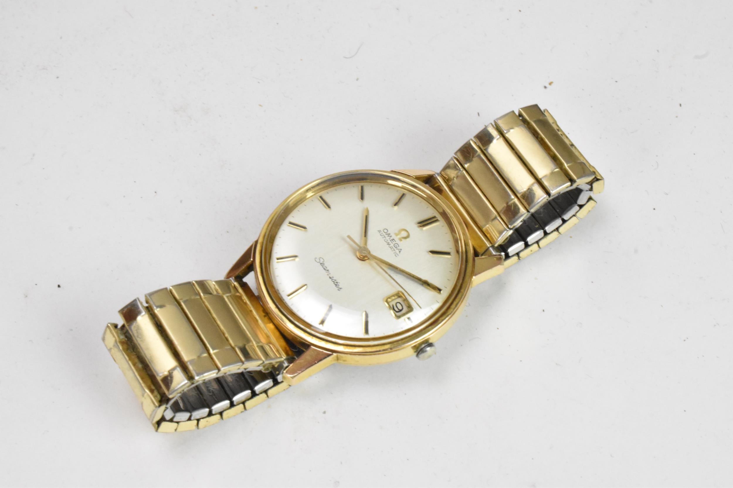 An Omega Seamaster, automatic, gents, gold plated wristwatch, having a silvered dial, centre - Image 2 of 9