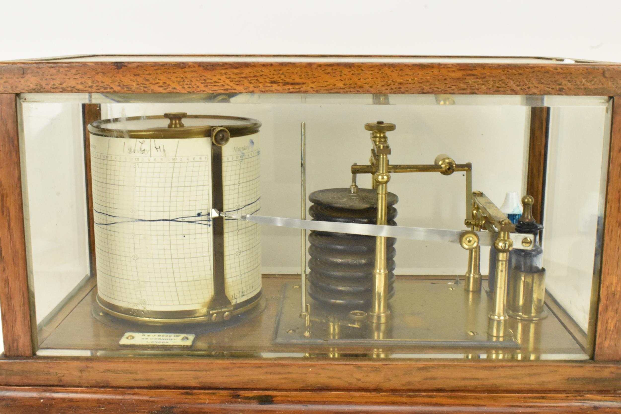 An early 20th century barograph, the oak case with bevelled glass and chart drawer, labelled 'J Beck - Image 2 of 7