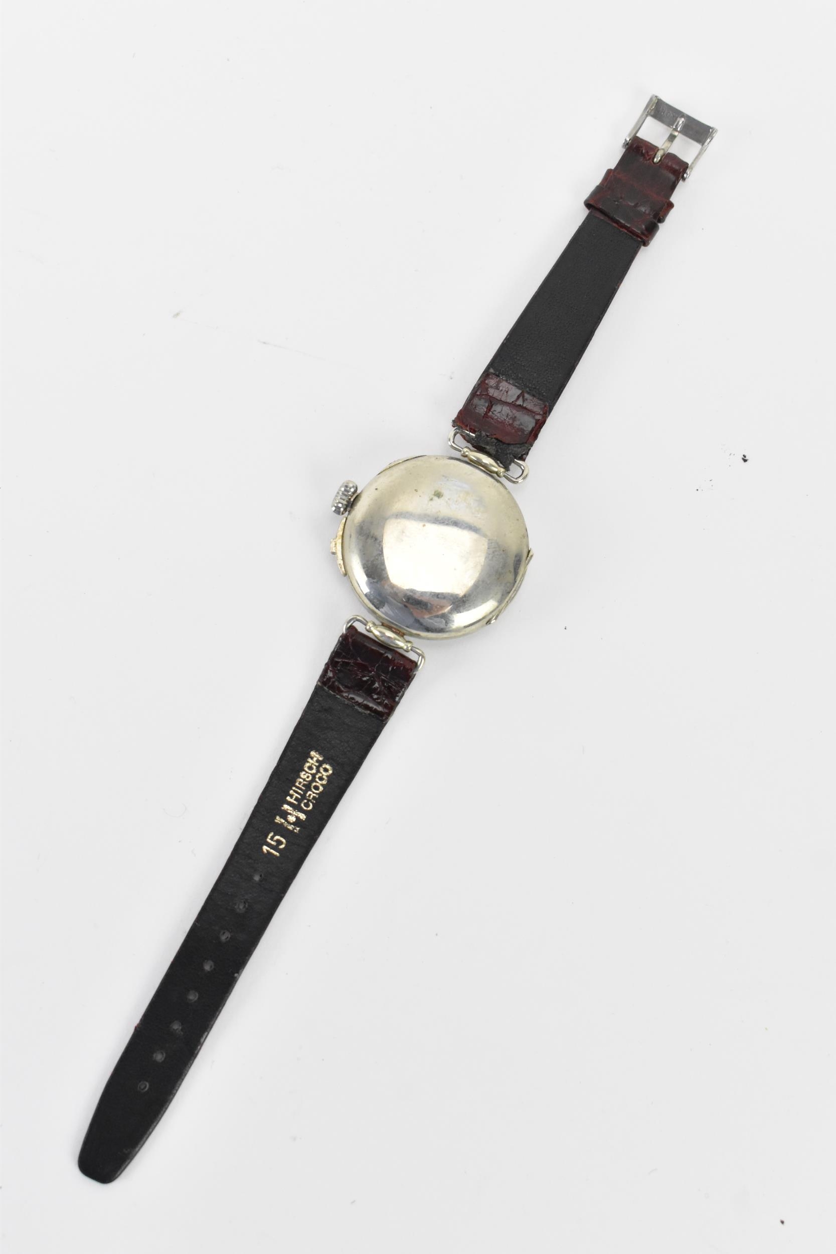 An unusual early 20th century trench style wristwatch to time a game of rugby, the white enamel dial - Image 4 of 5