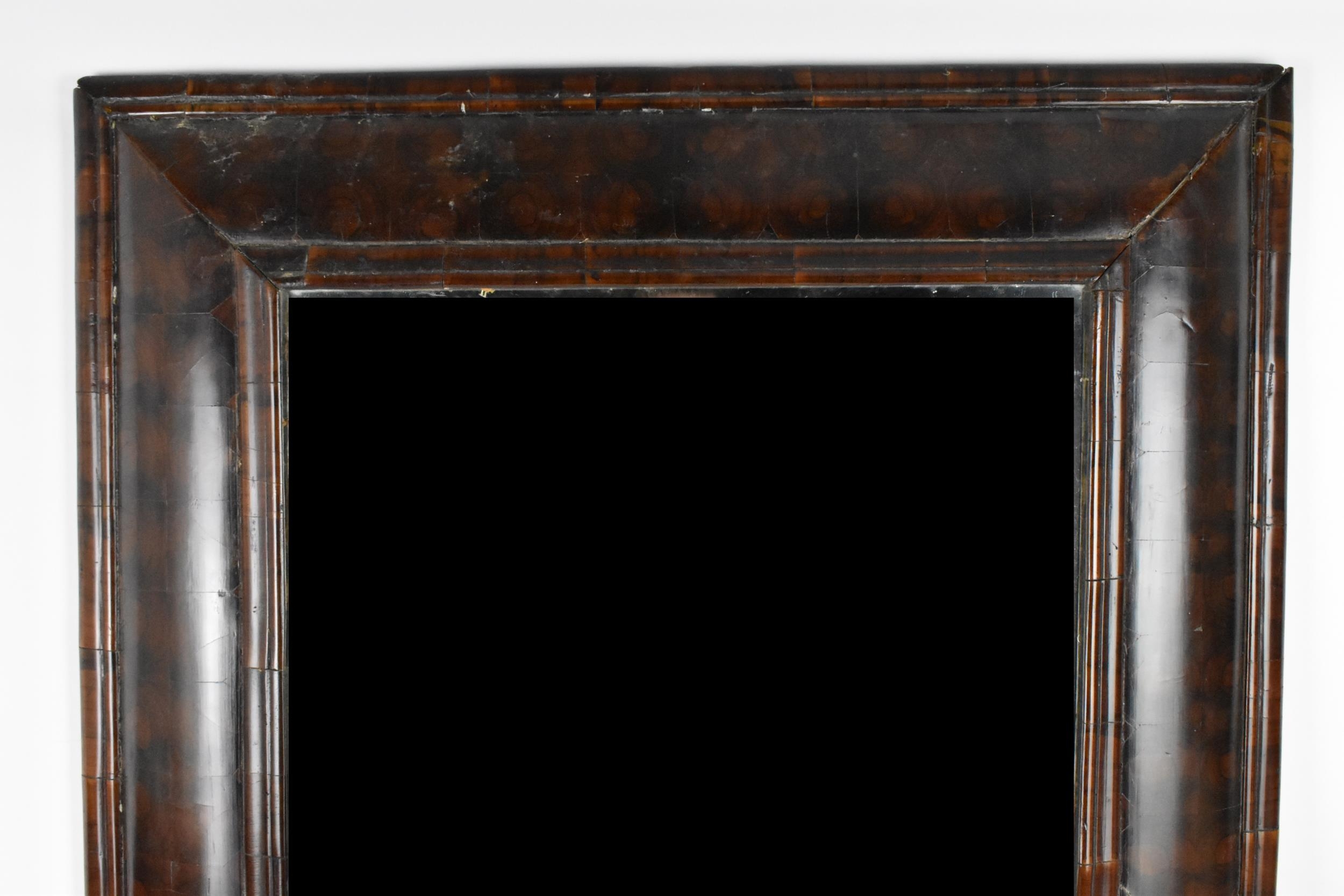 A William and Mary walnut oyster veneered mirror, circa 1690, having a cushion moulded frame, the - Image 2 of 6