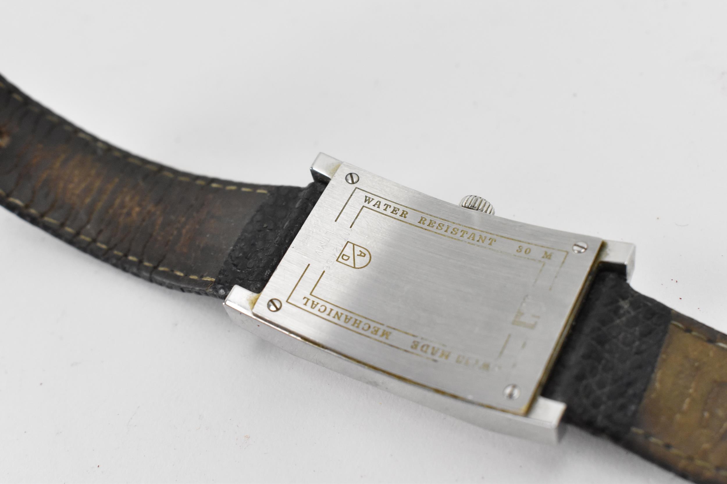 A Dunhill, manual wind, gents, stainless steel wristwatch, circa 1996, having a silvered dial, baton - Image 4 of 5